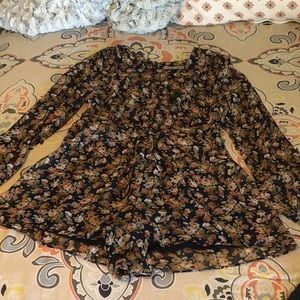 Floral Foreign Exchange romper!